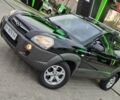 Черный Хендай Туксон, объемом двигателя 2.7 л и пробегом 224 тыс. км за 9555 $, фото 92 на Automoto.ua