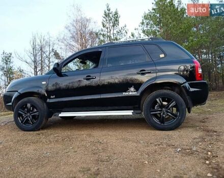 Чорний Хендай Туксон, об'ємом двигуна 1.98 л та пробігом 172 тис. км за 9500 $, фото 7 на Automoto.ua