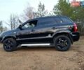 Чорний Хендай Туксон, об'ємом двигуна 1.98 л та пробігом 172 тис. км за 9500 $, фото 7 на Automoto.ua