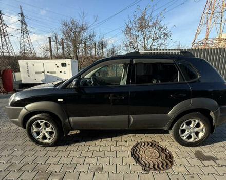 Черный Хендай Туксон, объемом двигателя 1.98 л и пробегом 220 тыс. км за 7500 $, фото 7 на Automoto.ua