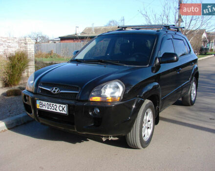 Черный Хендай Туксон, объемом двигателя 2 л и пробегом 162 тыс. км за 8200 $, фото 1 на Automoto.ua