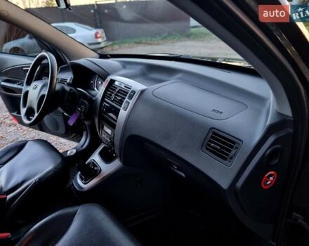 Хендай Туксон 2009 в Виннице на Automoto.ua Черный Хендай Туксон, объемом двигателя 2 л и пробегом 188 тыс. км за 9200 $, фото 43 на Automoto.ua