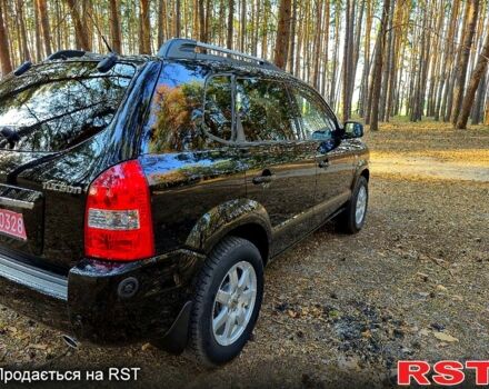 Черный Хендай Туксон, объемом двигателя 2 л и пробегом 204 тыс. км за 8900 $, фото 4 на Automoto.ua