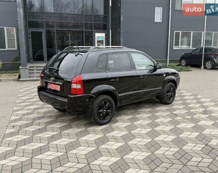 Черный Хендай Туксон, объемом двигателя 2 л и пробегом 191 тыс. км за 8500 $, фото 9 на Automoto.ua