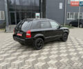 Черный Хендай Туксон, объемом двигателя 2 л и пробегом 191 тыс. км за 8500 $, фото 9 на Automoto.ua