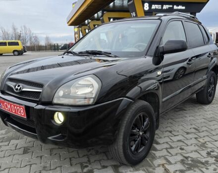 Черный Хендай Туксон, объемом двигателя 2 л и пробегом 198 тыс. км за 7999 $, фото 5 на Automoto.ua