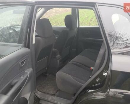 Черный Хендай Туксон, объемом двигателя 2 л и пробегом 198 тыс. км за 8200 $, фото 6 на Automoto.ua