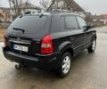 Черный Хендай Туксон, объемом двигателя 2 л и пробегом 128 тыс. км за 9200 $, фото 1 на Automoto.ua