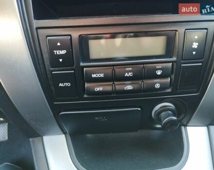 Черный Хендай Туксон, объемом двигателя 1.99 л и пробегом 159 тыс. км за 9700 $, фото 19 на Automoto.ua