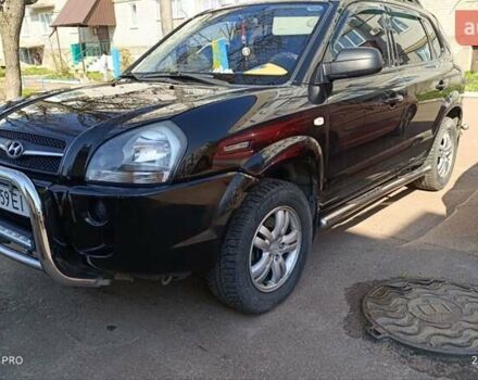 Черный Хендай Туксон, объемом двигателя 2 л и пробегом 226 тыс. км за 8700 $, фото 16 на Automoto.ua