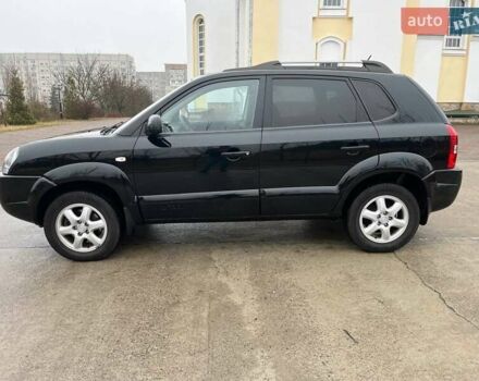 Черный Хендай Туксон, объемом двигателя 2 л и пробегом 128 тыс. км за 9200 $, фото 3 на Automoto.ua