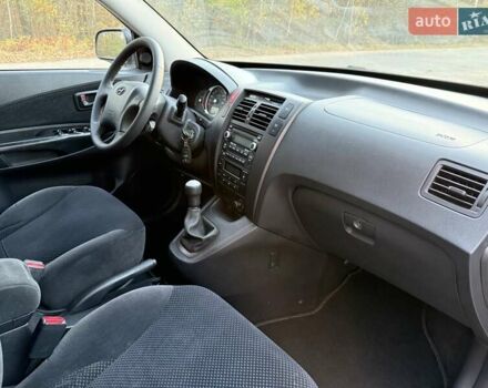 Черный Хендай Туксон, объемом двигателя 2 л и пробегом 148 тыс. км за 8700 $, фото 23 на Automoto.ua