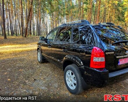 Черный Хендай Туксон, объемом двигателя 2 л и пробегом 204 тыс. км за 8900 $, фото 3 на Automoto.ua