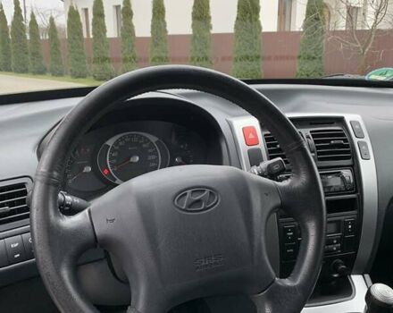 Черный Хендай Туксон, объемом двигателя 2 л и пробегом 114 тыс. км за 8850 $, фото 38 на Automoto.ua