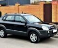 Черный Хендай Туксон, объемом двигателя 2 л и пробегом 102 тыс. км за 10900 $, фото 1 на Automoto.ua