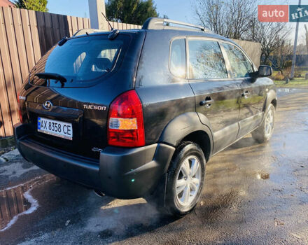 Черный Хендай Туксон, объемом двигателя 1.99 л и пробегом 95 тыс. км за 8500 $, фото 20 на Automoto.ua