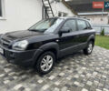 Чорний Хендай Туксон, об'ємом двигуна 2 л та пробігом 200 тис. км за 8450 $, фото 4 на Automoto.ua