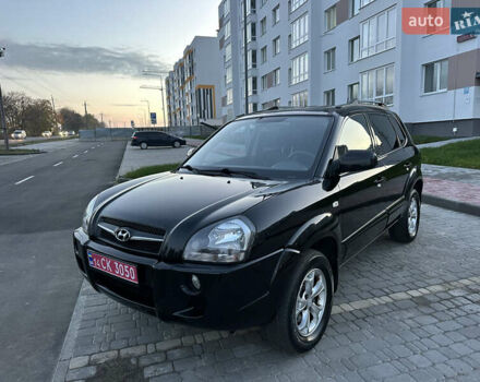 Черный Хендай Туксон, объемом двигателя 2 л и пробегом 131 тыс. км за 9199 $, фото 1 на Automoto.ua