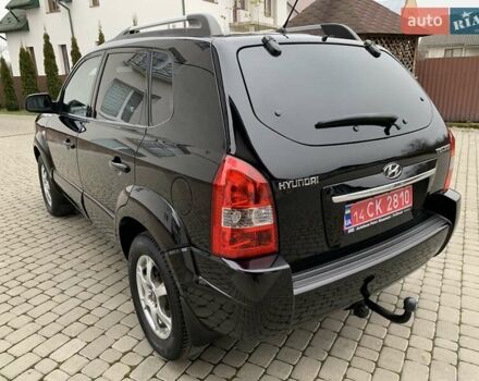 Черный Хендай Туксон, объемом двигателя 2 л и пробегом 114 тыс. км за 8850 $, фото 11 на Automoto.ua