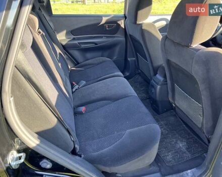 Черный Хендай Туксон, объемом двигателя 2 л и пробегом 198 тыс. км за 8200 $, фото 14 на Automoto.ua