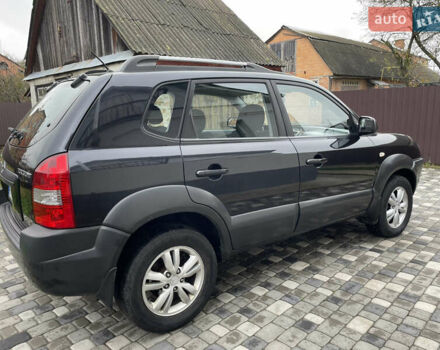 Чорний Хендай Туксон, об'ємом двигуна 2 л та пробігом 200 тис. км за 8450 $, фото 12 на Automoto.ua