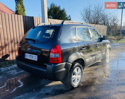 Черный Хендай Туксон, объемом двигателя 1.99 л и пробегом 95 тыс. км за 8500 $, фото 25 на Automoto.ua