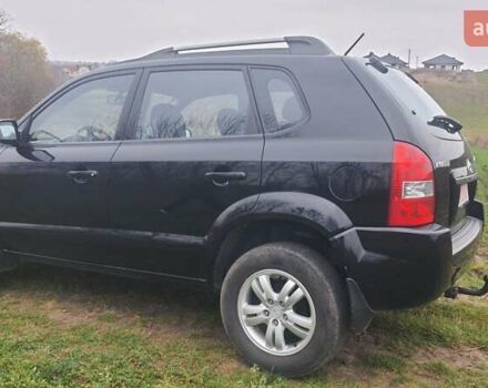 Черный Хендай Туксон, объемом двигателя 2 л и пробегом 198 тыс. км за 8200 $, фото 12 на Automoto.ua