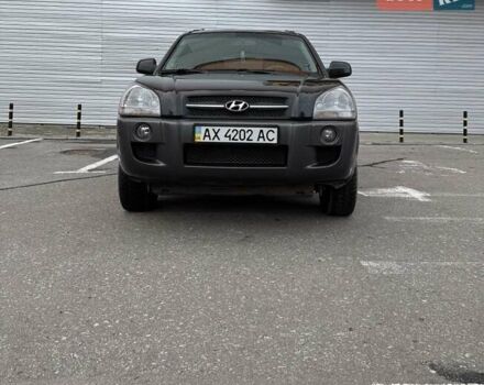 Черный Хендай Туксон, объемом двигателя 2 л и пробегом 282 тыс. км за 8700 $, фото 1 на Automoto.ua