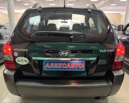Черный Хендай Туксон, объемом двигателя 2 л и пробегом 160 тыс. км за 8300 $, фото 4 на Automoto.ua