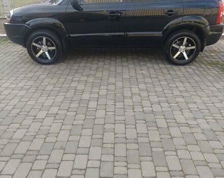 Черный Хендай Туксон, объемом двигателя 1.98 л и пробегом 51 тыс. км за 12800 $, фото 16 на Automoto.ua