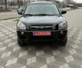 Черный Хендай Туксон, объемом двигателя 2 л и пробегом 191 тыс. км за 8500 $, фото 3 на Automoto.ua