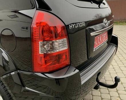 Черный Хендай Туксон, объемом двигателя 2 л и пробегом 114 тыс. км за 8850 $, фото 21 на Automoto.ua