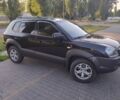 Чорний Хендай Туксон, об'ємом двигуна 2 л та пробігом 230 тис. км за 7150 $, фото 1 на Automoto.ua
