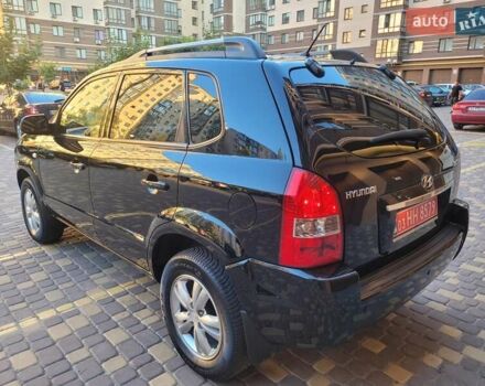 Черный Хендай Туксон, объемом двигателя 2 л и пробегом 135 тыс. км за 9750 $, фото 6 на Automoto.ua