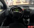 Черный Хендай Туксон, объемом двигателя 2 л и пробегом 160 тыс. км за 8800 $, фото 7 на Automoto.ua