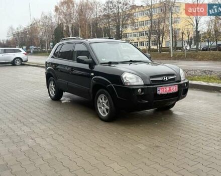 Черный Хендай Туксон, объемом двигателя 2 л и пробегом 237 тыс. км за 8350 $, фото 18 на Automoto.ua