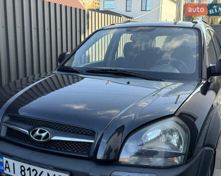 Чорний Хендай Туксон, об'ємом двигуна 1.98 л та пробігом 200 тис. км за 8200 $, фото 1 на Automoto.ua
