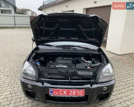 Черный Хендай Туксон, объемом двигателя 2 л и пробегом 114 тыс. км за 8850 $, фото 63 на Automoto.ua