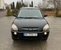 Черный Хендай Туксон, объемом двигателя 2 л и пробегом 128 тыс. км за 9200 $, фото 1 на Automoto.ua