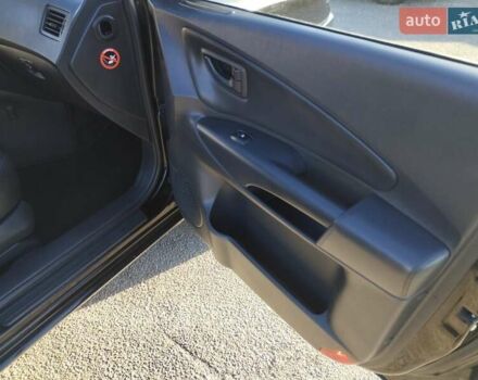 Черный Хендай Туксон, объемом двигателя 1.99 л и пробегом 159 тыс. км за 9700 $, фото 12 на Automoto.ua