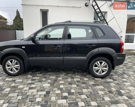 Чорний Хендай Туксон, об'ємом двигуна 2 л та пробігом 200 тис. км за 8450 $, фото 9 на Automoto.ua
