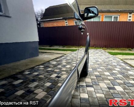 Чорний Хендай Туксон, об'ємом двигуна 2 л та пробігом 200 тис. км за 8499 $, фото 6 на Automoto.ua