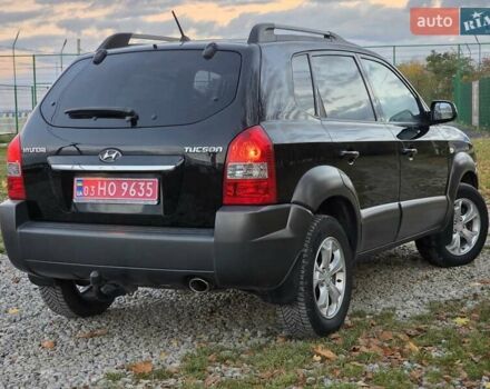 Хендай Туксон 2009 в Гусятине на Automoto.ua Черный Хендай Туксон, объемом двигателя 2 л и пробегом 143 тыс. км за 9700 $, фото 1 на Automoto.ua