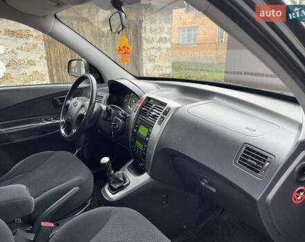 Чорний Хендай Туксон, об'ємом двигуна 2 л та пробігом 200 тис. км за 8450 $, фото 28 на Automoto.ua