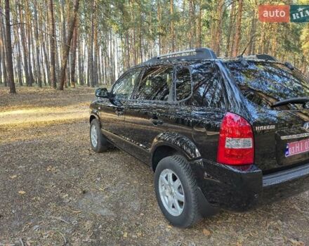 Чорний Хендай Туксон, об'ємом двигуна 2 л та пробігом 201 тис. км за 8999 $, фото 7 на Automoto.ua