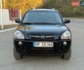 Черный Хендай Туксон, объемом двигателя 2 л и пробегом 148 тыс. км за 8700 $, фото 6 на Automoto.ua