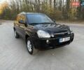 Черный Хендай Туксон, объемом двигателя 2 л и пробегом 148 тыс. км за 8700 $, фото 7 на Automoto.ua