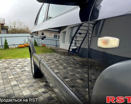 Чорний Хендай Туксон, об'ємом двигуна 2 л та пробігом 200 тис. км за 8499 $, фото 7 на Automoto.ua