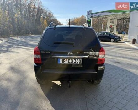 Черный Хендай Туксон, объемом двигателя 2 л и пробегом 148 тыс. км за 8700 $, фото 35 на Automoto.ua