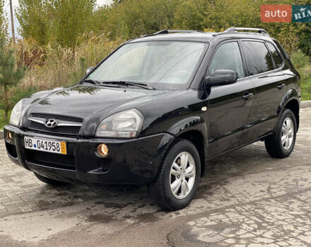 Черный Хендай Туксон, объемом двигателя 2 л и пробегом 191 тыс. км за 7800 $, фото 2 на Automoto.ua